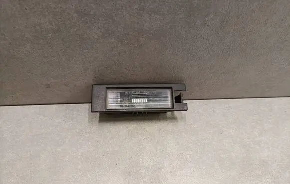 Opel Astra H Number plate light 1313990