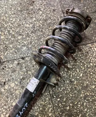 Volkswagen Caddy Front shock absorber/damper