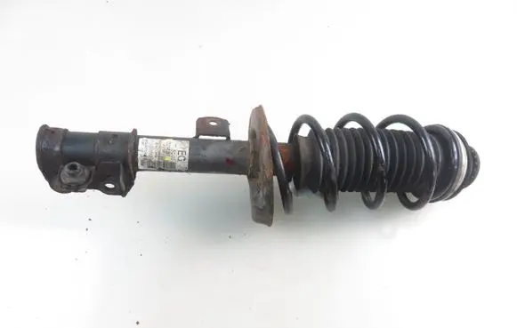 Opel Corsa D Front shock absorber with coil spring 13214357