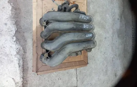 Volkswagen PASSAT B5.5 Intake manifold 06B133210AS