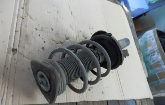 Mazda 3 II Rear shock absorber with coil spring TK4834900B