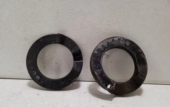 Volkswagen Touareg II Rear coil spring rubber mount 7P0411177 7P0411189A