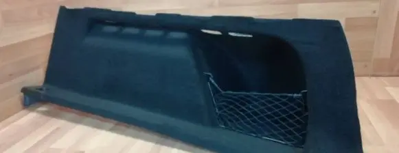 Trunk/boot lower side trim panel