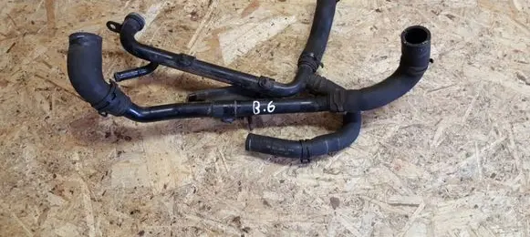 Volkswagen PASSAT B6 Engine coolant pipe/hose 06F121058D 06F121065J