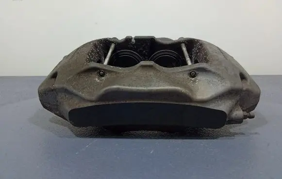 Volkswagen Touareg II Front brake caliper 7P6615105AE