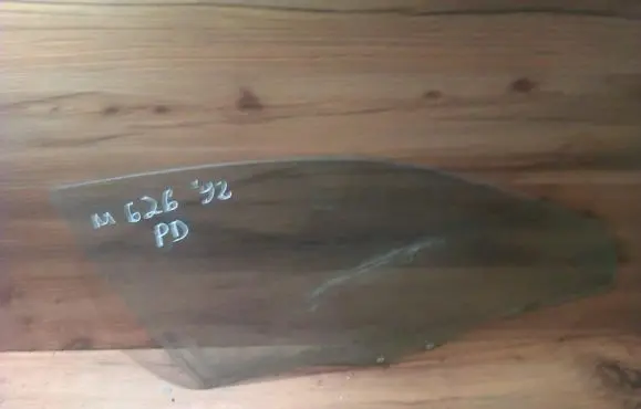 Mazda 626 Front door window glass four-door