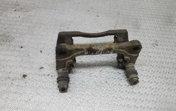 Suzuki Swift I Front Brake Caliper Pad/Carrier 