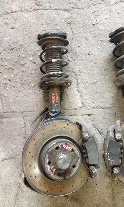 Front wheel hub spindle knuckle