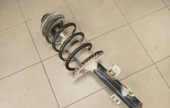Volkswagen Transporter - Caravelle T5 Front shock absorber with coil spring 7H0413031