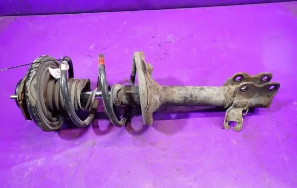 Nissan X-Trail T30 Front shock absorber with coil spring 