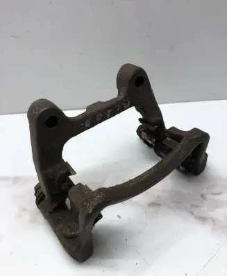 Volkswagen PASSAT B6 Brake caliper pad carrier rear 