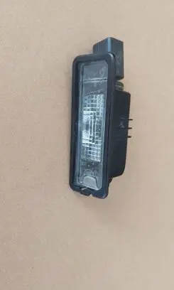 Volkswagen Golf VI Number plate light 1K8943021