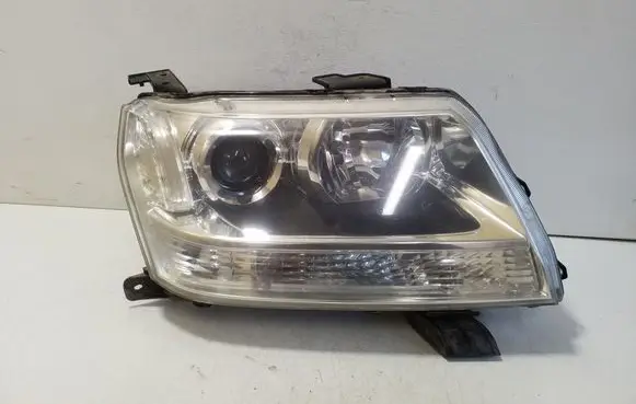 Suzuki Grand Vitara II Headlight/headlamp 10059079