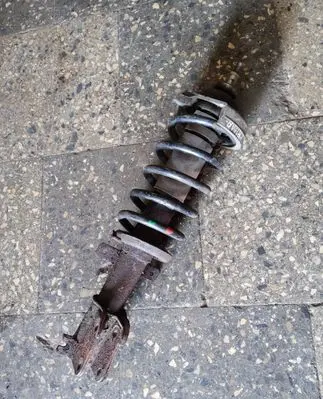 Nissan Primastar Front shock absorber with coil spring 93860763