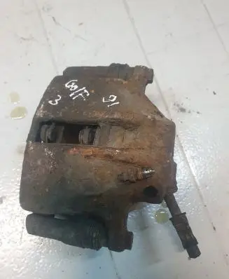 Volkswagen Golf III Front brake caliper