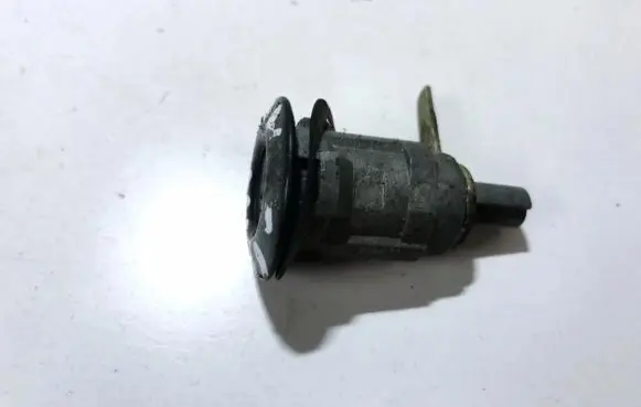 Mazda 626 Front door lock (next to the handle) 