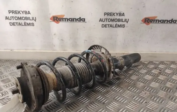 Volkswagen Polo Front shock absorber with coil spring 383330EGT