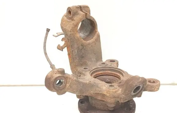 Volkswagen Touran I Front wheel hub spindle knuckle 7H0927803