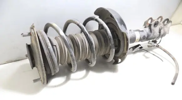 Toyota Corolla E210 E21 Front shock absorber with coil spring