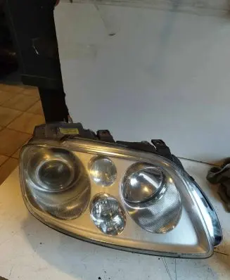 Volkswagen Touran I Headlight/headlamp 1T0941032K 14531455 0301205272