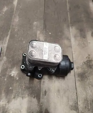 Volkswagen Caddy Oil filter mounting bracket 03L117021C