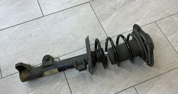 Mercedes-Benz E W212 Front shock absorber with coil spring A2123201238