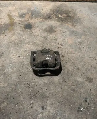 Opel Astra J Front brake caliper 