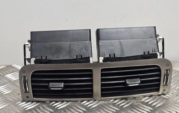 Jaguar XK - XKR Dash center air vent grill 6W8319K617A D1B1A E122510912