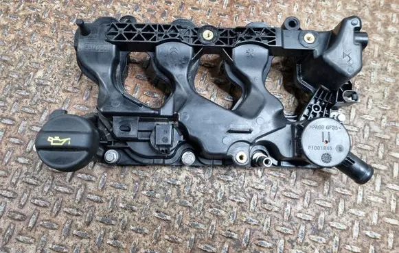 Rocker cam cover