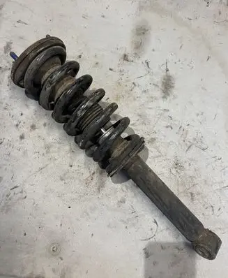 Mitsubishi Pajero Front shock absorber with coil spring