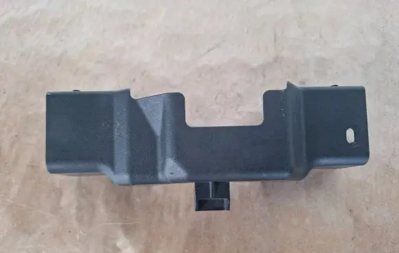 Engine bonnet/hood lock trim molding