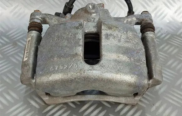 Volkswagen Golf VII Front brake caliper