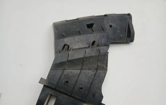 Front bumper mounting bracket