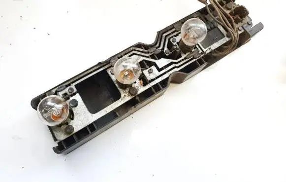 Volkswagen II LT Tail light bulb cover holder