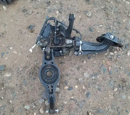 Rear wheel hub spindle/knuckle