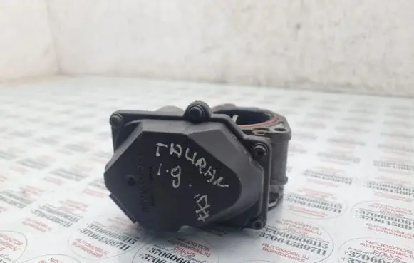 Volkswagen Touran I Throttle valve 03G128063A