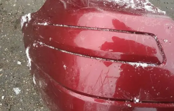 Rear bumper trim bar molding