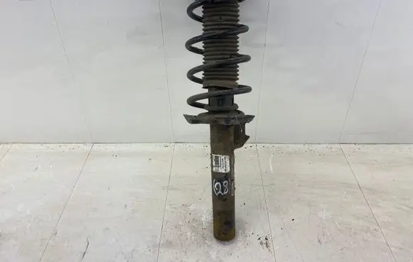 Volkswagen Golf V Front shock absorber with coil spring 1K0413031CR