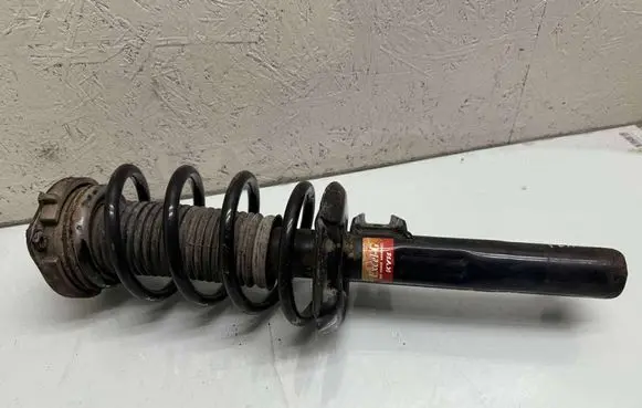 Front shock absorber with coil spring