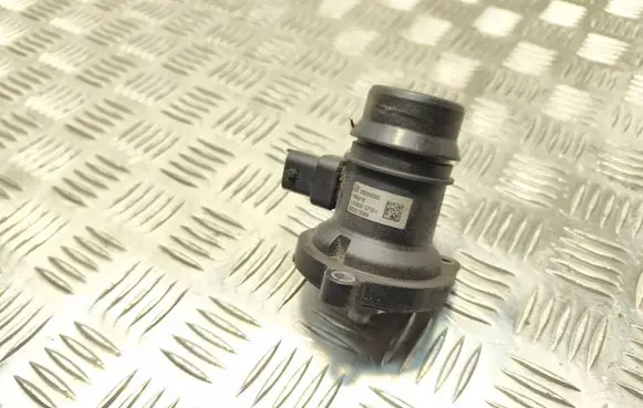Thermostat/thermostat housing