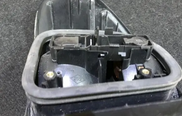 Renault Laguna I Tail light bulb cover holder