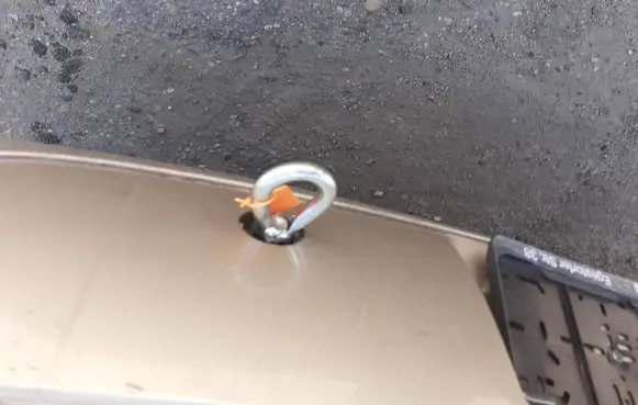 Towing hook eye