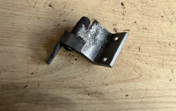 Rear door upper hinge