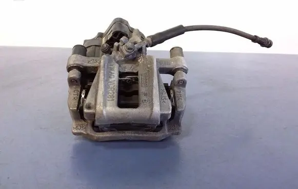 Volkswagen Golf Sportsvan Rear brake caliper 