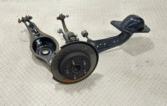 Rear wheel hub spindle/knuckle
