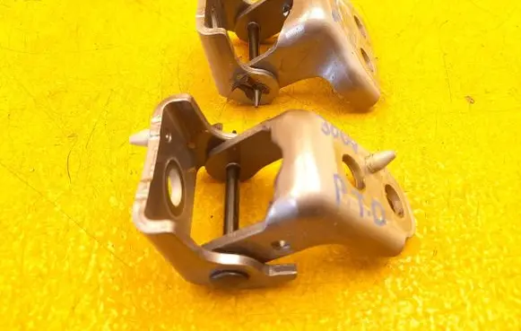 Rear door upper hinge