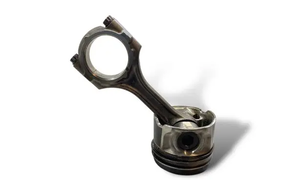 Piston with connecting rod