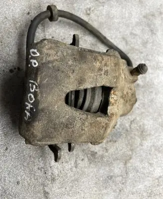 Volkswagen Golf IV Front brake caliper