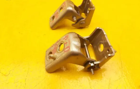 Rear door upper hinge