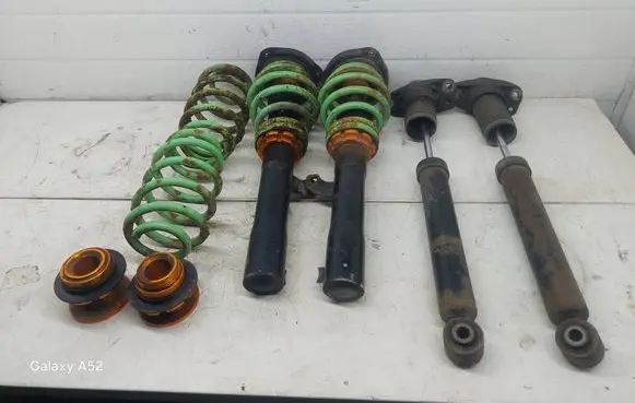 Volkswagen PASSAT CC Front shock absorber with coil spring QH02 ULT1501